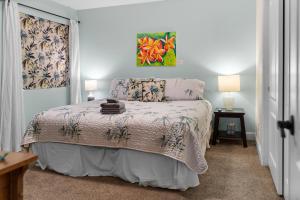 Postel nebo postele na pokoji v ubytování Hawaiian Coffee Hale