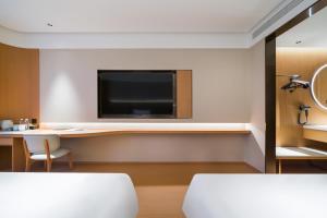 Μια τηλεόραση ή/και κέντρο ψυχαγωγίας στο JI Hotel Shanghai Fengxian New Town Nanfeng Road +11 φωτογραφίες