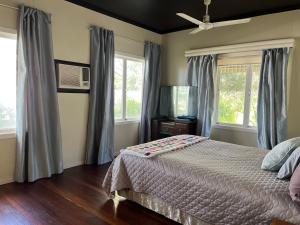 Postel nebo postele na pokoji v ubytování The Retro Rest