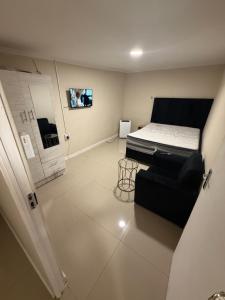 TV a/nebo společenská místnost v ubytování Joy House