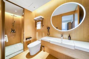 Ένα μπάνιο στο JI Hotel Shanghai Chongming Changxing Island +19 φωτογραφίες