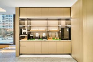 Η κουζίνα ή μικρή κουζίνα στο JI Hotel Shanghai Chongming Changxing Island
