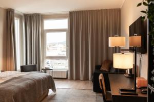 Giường trong phòng chung tại Home Hotel Helma +25 ảnh