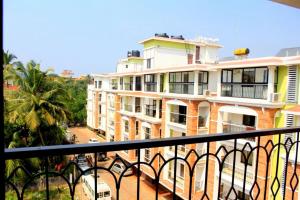 a view of a building from a balcony at 1bhk Premium BS1 - Candolim Calangute Area in Candolim