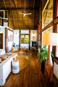 a living room with a couch and a table at The Overhang in Dar es Salaam