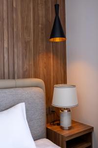 Postel nebo postele na pokoji v ubytování Kana Suites Jimbaran By Fays Hospitality + 17 fotografií