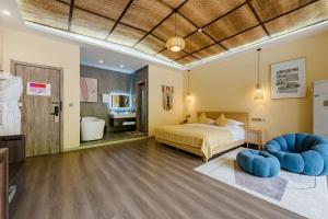 Postel nebo postele na pokoji v ubytování Huazhu Luxury Peach Blossom Ridge Homestay + 142 fotografií