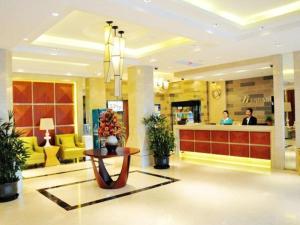 a lobby of a store with a counter and people at Jinjiang Inn Suzhou Baiyang Bay Jin Chang New Town in Suzhou