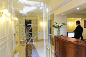 The lobby or reception area at Hotel Villa Rosa