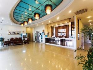 a lobby of a hospital with a counter in the middle at Jingjiang Inn Suzhou Industrial Park Donghuan Road in Suzhou