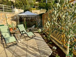 Zahrada ubytování ULIVI - Comodità e tranquillità con Patio e Parcheggio + 24 fotografií