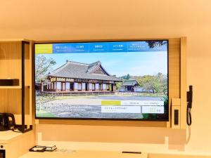 TV a/nebo společenská místnost v ubytování Comfort Hotel Mito