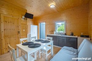 Kuchyň nebo kuchyňský kout v ubytování MożeMorze? Ośrodek Domków Letniskowych