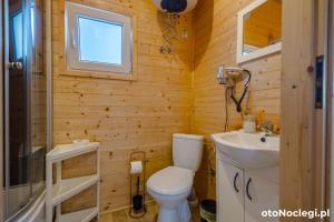 Koupelna v ubytování MożeMorze? Ośrodek Domków Letniskowych + 13 fotografií