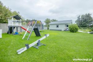 Herní místnost nebo prostor pro děti v ubytování MożeMorze? Ośrodek Domków Letniskowych