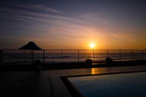 Solopgangen eller solnedgangen set fra villaen