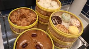 a group of four baskets filled with different types of donuts at Jinjiang Inn Changchun Xi An Avenue Branch in Changchun