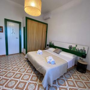 Postel nebo postele na pokoji v ubytování bolinajazz