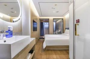 Ένα μπάνιο στο Hanting Hotel Shanghai South Shaanxi Road Subway Station +26 φωτογραφίες