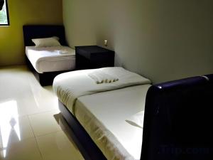 Postel nebo postele na pokoji v ubytování OYO 89780 Lodge 37