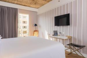 Μια τηλεόραση ή/και κέντρο ψυχαγωγίας στο Faranda Collection Barranquilla, a member of Radisson Individuals