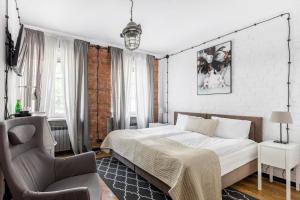 Posteľ alebo postele v izbe v ubytovaní ARTHOTEL STALOWA 52 + 37 fotografií