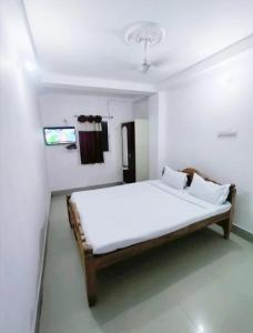 Ένα ή περισσότερα κρεβάτια σε δωμάτιο στο Hotel Luxury Heaven