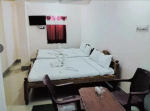 Ένα ή περισσότερα κρεβάτια σε δωμάτιο στο Hotel Luxury Heaven