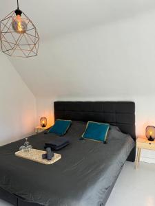 Postel nebo postele na pokoji v ubytování charmante vakantiewoning nabij Brugge