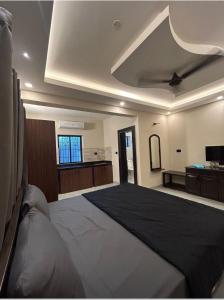 Ένα ή περισσότερα κρεβάτια σε δωμάτιο στο Bob's Guest House