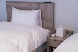 Postel nebo postele na pokoji v ubytování Tateyama - House - Vacation STAY 19588