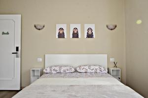 Postel nebo postele na pokoji v ubytování A Casa di Alfonso Malpensa Airport