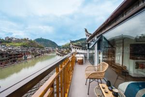 Fotografie z fotogalerie ubytování Fenghuang Sulv Yunzhu River View Homestay v destinaci Feng-chuang