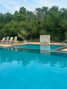 Bazén v ubytování OrientalResort Kekirawa nebo v jeho okolí