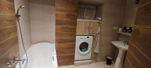 Koupelna v ubytování Pod Bocianem Noclegi + 59 fotografií