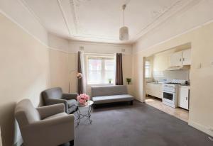 Кухня или мини-кухня в Burwood central unit
