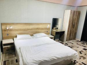 Postel nebo postele na pokoji v ubytování ObodHotel