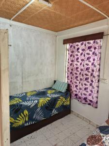 Ένα ή περισσότερα κρεβάτια σε δωμάτιο στο Cozy Blooms