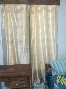 Ένα ή περισσότερα κρεβάτια σε δωμάτιο στο Cozy Blooms