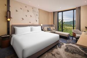 Postel nebo postele na pokoji v ubytování Crowne Plaza Labuan Bajo by IHG + 35 fotografií