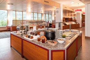 Kuchyň nebo kuchyňský kout v ubytování Vivea Hotel Bad Goisern