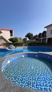 Bazén v ubytování kpj corbett manor nebo v jeho okolí