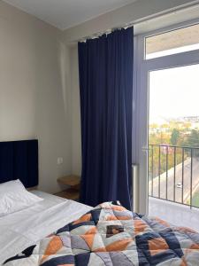 Ένα ή περισσότερα κρεβάτια σε δωμάτιο στο Apartment mountine viev