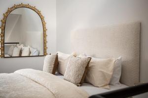 Ένα ή περισσότερα κρεβάτια σε δωμάτιο στο The Nest