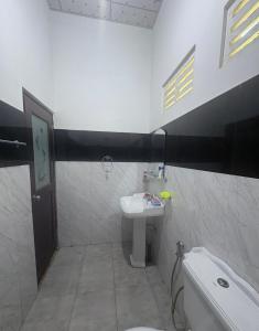 Vannituba majutusasutuses Sunny Home Udawalawa