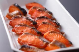 a white dish filled with peeled orange slices at KOKO HOTEL Kobe Sannomiya in Kobe