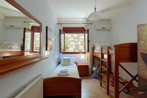 Postel nebo postele na pokoji v ubytování Ferienhaus Dioni Für 6 Personen Und 1 Kind