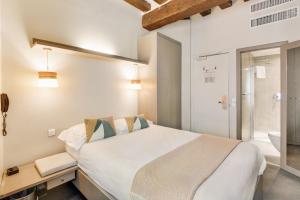 Postel nebo postele na pokoji v ubytování Villa Des Princes