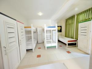 Postel nebo postele na pokoji v ubytování The Youth Hostel - It's a Youth Fame + 48 fotografií