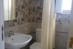 Ванная комната в Dolphin Reef suites one bed room